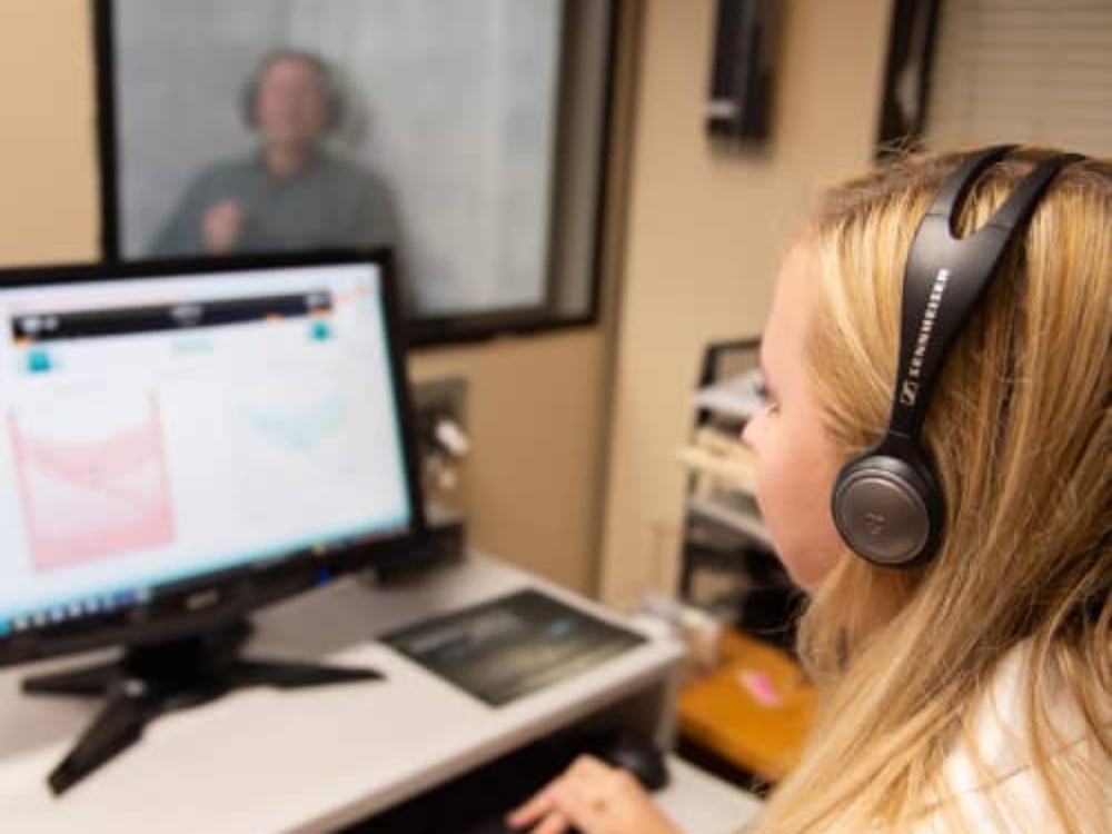 Dr. Beverly Lew, Au.D. performing a comprehensive hearing evaluation at Sound Advice in Burbank, CA