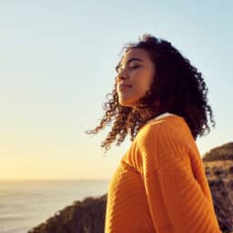 Woman looking calm after managing her tinnitus