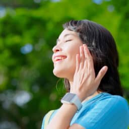 Woman finding relief from tinnitus.